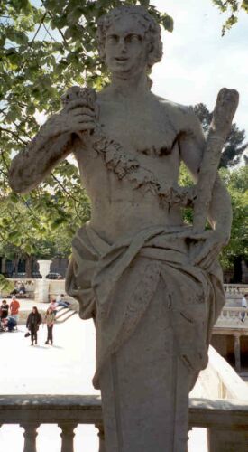 Our kind of god, Bacchus, the god of wine. He's standing in a Roman sculpture park, in Nimes.