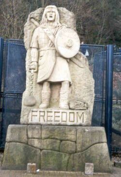 Americans paid for this and had it placed near the real William Wallace monument. The U.S. presence may explain why its an ugly expensive thing with little connection to reality at all. (Wallace Monument, Stirling)