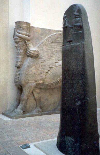 Hammurapi's Code, with a bull of Sargon's in the background.
