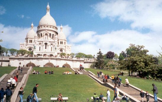Mostly just an excuse to show of Sacre Coeur, still, you can see one of those wretched friendship bracelet peddlers  in the far bottom right corner. Also, if you've seen 'Amelie' you might remember those right stairs from the film.